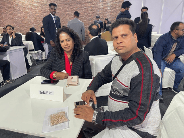 Discussing chickpea samples at a business meeting