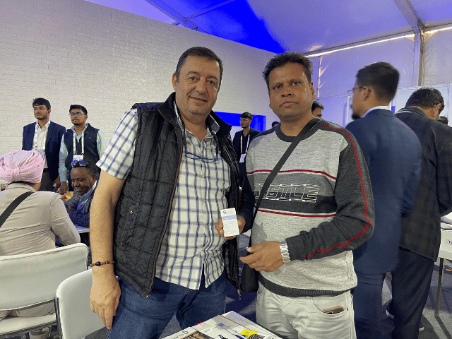Meeting an international trade participant at an industry event